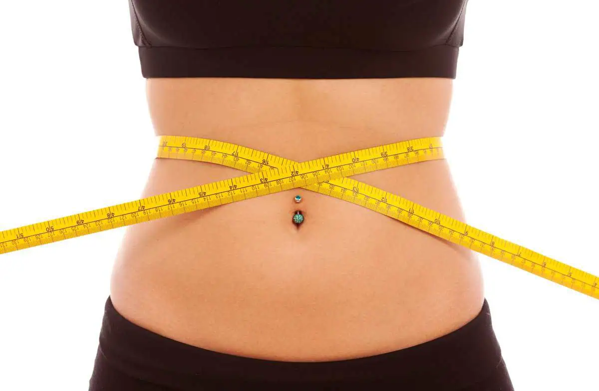Slim waist with tape measure at PureSkin Aesthetics Stillwater