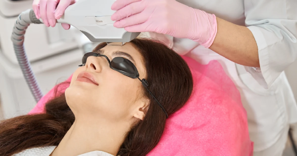 Woman receiving a photofacial treatment in Stillwater, OK